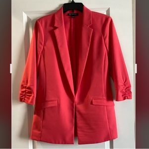 Beautiful INC coral blazer with 3/4 sleeves. Good condition, flattering fit.